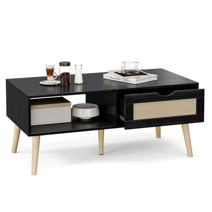 Boho Coffee Table with Sliding Rattan Door and Solid Wood Legs, Small Living Room Table with Storage, Black